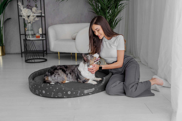 Owalne legowisko kojec dla psa Welsti ciemny szary srebrne kości i łapki XL 80x67 wigofil