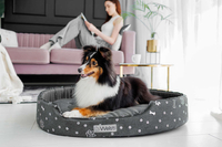 Owalne legowisko kojec dla psa Welsti ciemny szary srebrne kości i łapki XL 80x67 antypoślizgowy