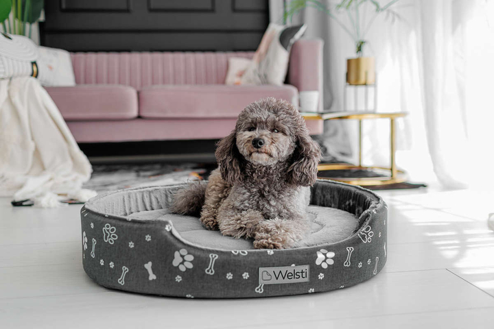 Owalne legowisko kojec dla psa Welsti ciemny szary srebrne kości i łapki L 68x55 wigofil