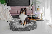 Owalne legowisko kojec dla psa Welsti ciemny szary srebrne kości i łapki XL 80x67 wigofil