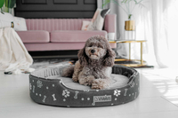 Owalne legowisko kojec dla psa Welsti ciemny szary srebrne kości i łapki L 68x55 antypoślizgowy